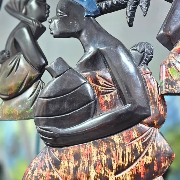 Hand-Carved Indigenous Woman Sculpture