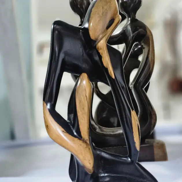 Hand-Carved Two-Tone Wood Sculpture