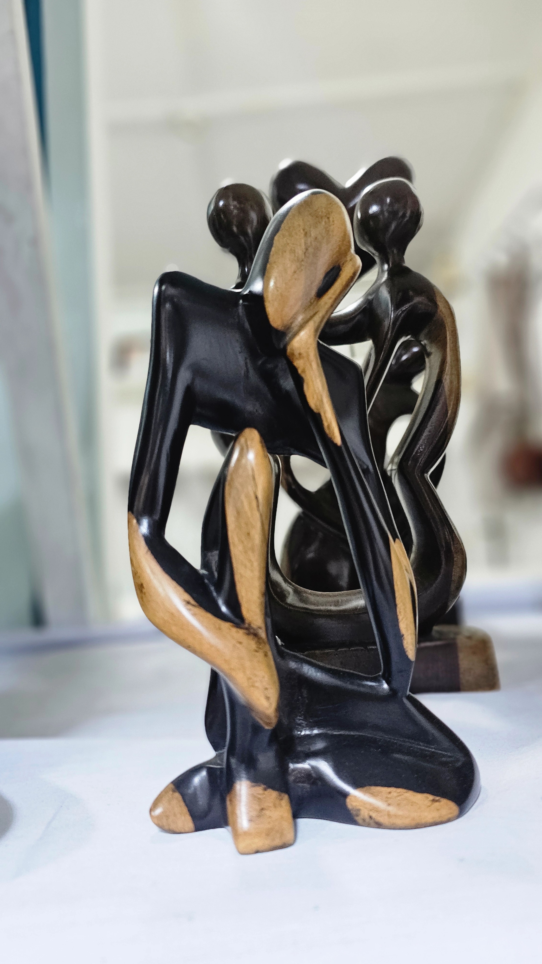 Hand-Carved Two-Tone Wood Sculpture